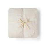 BAREFOOT DREAMS | Cloud Faux Fur Throw — Cream, Cloud Faux Fur Throw in Cream, folded and tied with a ribbon bow