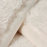 BAREFOOT DREAMS | Cloud Faux Fur Throw — Cream, Close-up of the Cloud Faux Fur Throw fabric in Cream