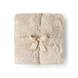BAREFOOT DREAMS | Cloud Faux Fur Throw — Sandstone, Cloud Faux Fur Throw in Sandstone, folded and tied with a ribbon bow