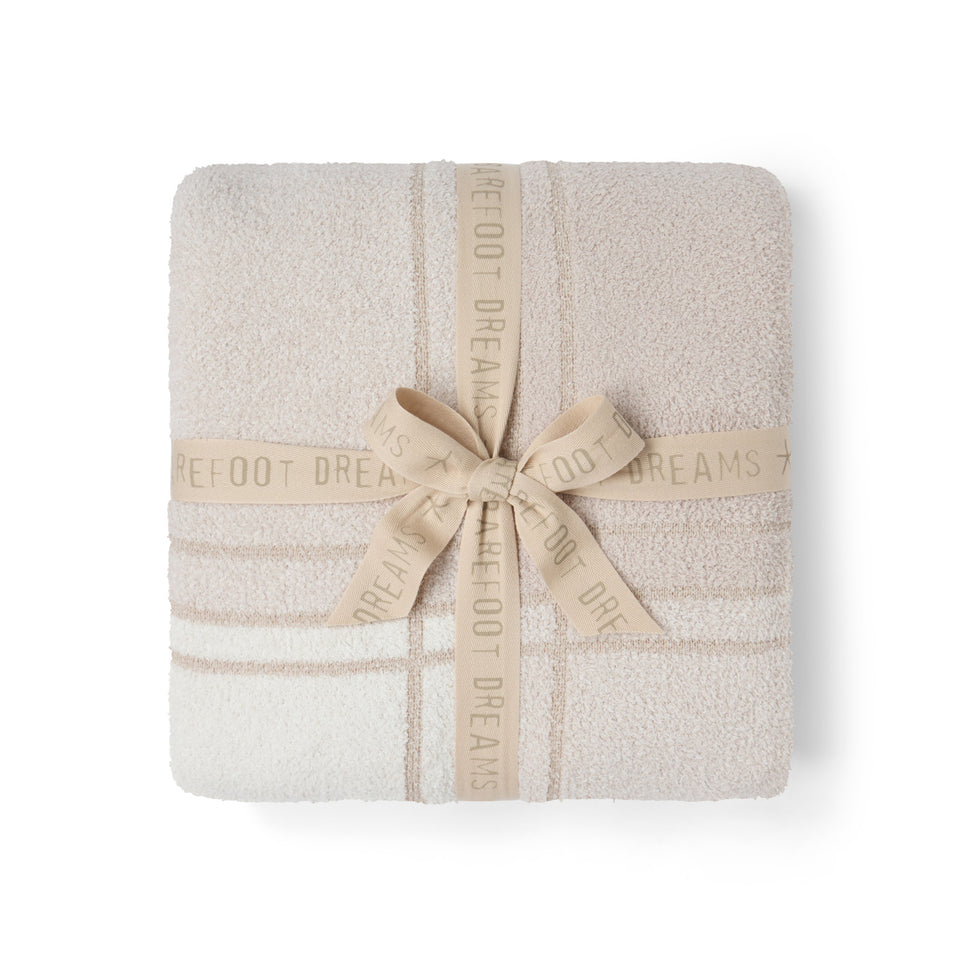 CozyChic Cotton Buffalo Plaid Throw in Stone Multi, folded and tied with a ribbon bow