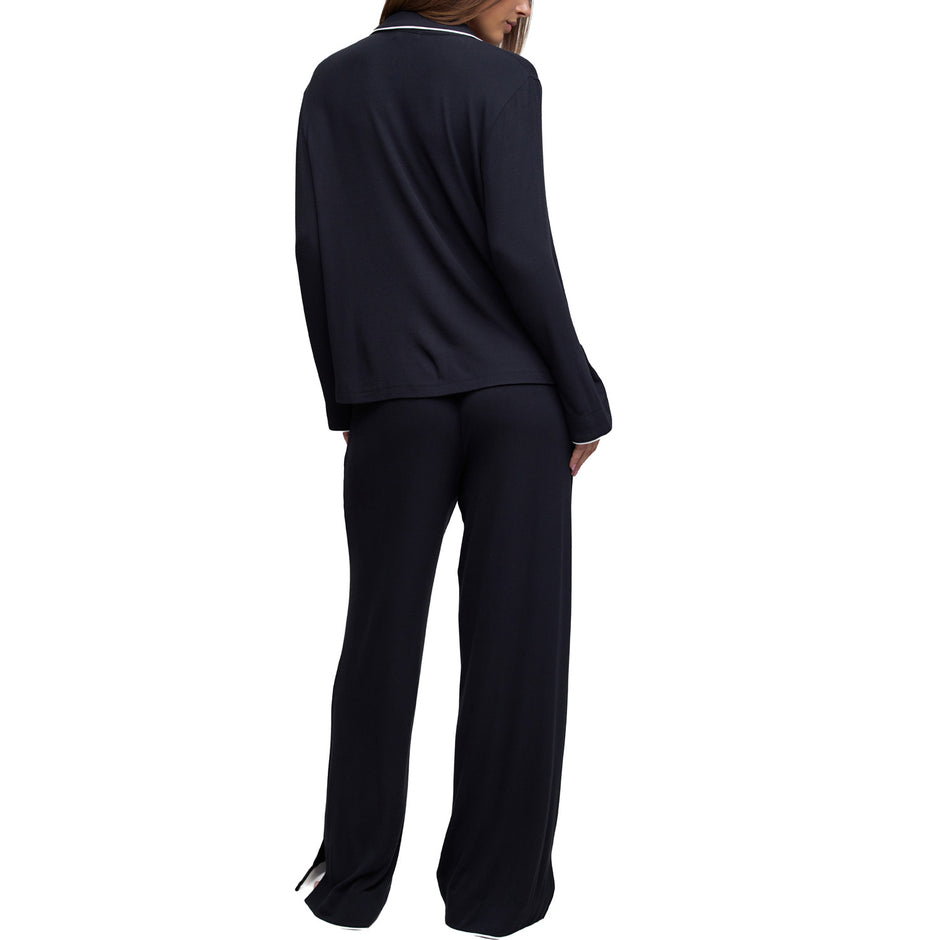 Back view of the Ultra Soft Rib sleep shirt and pant in Black with white piping