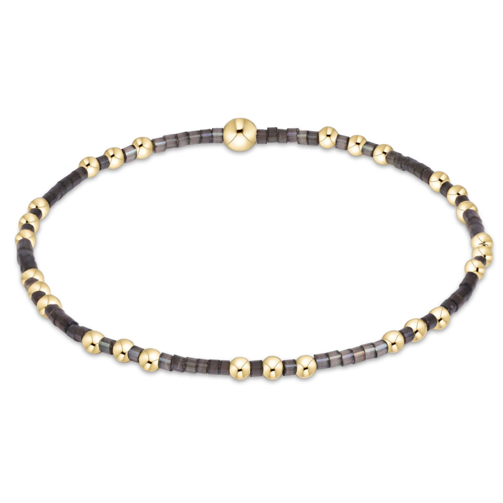 eNewton Hope Joy bracelet in Moonlight with 2mm seed beads and 14kt gold-filled beads on a stretch cord