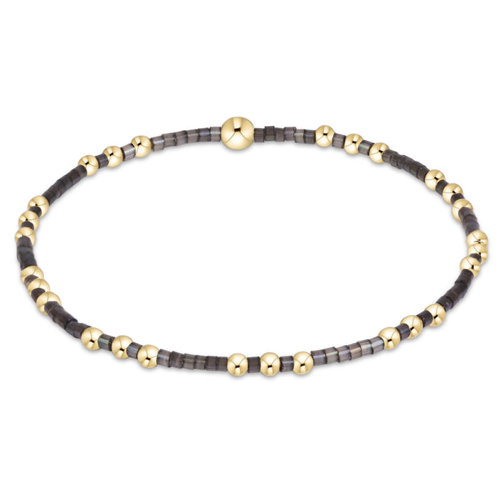 eNewton Hope Joy bracelet in Moonlight with 2mm seed beads and 14kt gold-filled beads on a stretch cord