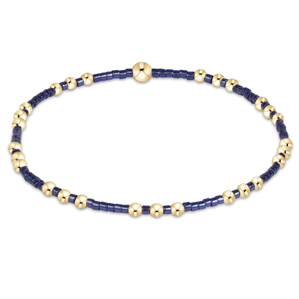 eNewton Hope Joy bracelet in Navy with 2mm seed beads and 14kt gold-filled beads on a stretch cord