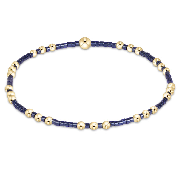 eNewton Hope Joy bracelet in Navy with 2mm seed beads and 14kt gold-filled beads on a stretch cord