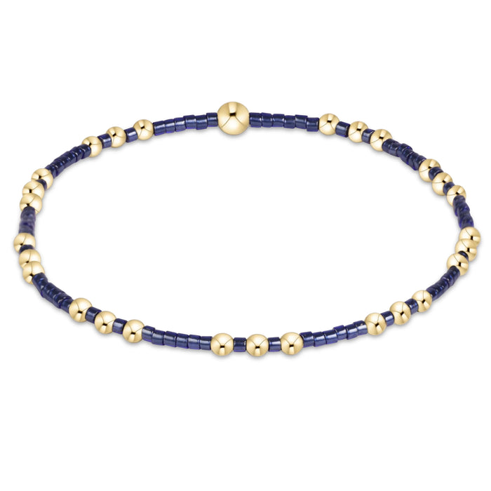 eNewton Hope Joy bracelet in Navy with 2mm seed beads and 14kt gold-filled beads on a stretch cord