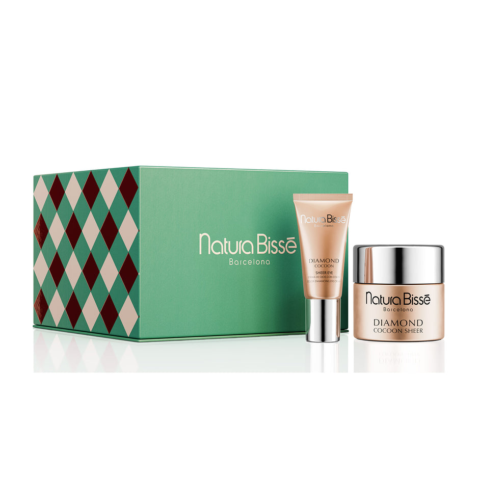 Green Natura Bisse holiday gift box with a Diamond Cocoon Sheer cream jar and Diamond Cocoon Sheer Eye tube