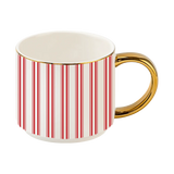 A white ceramic mug with vertical red stripes and a shiny gold handle and rim, shown on a plain white background.