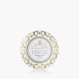 Voluspa candle tin with decorative pattern on a white background