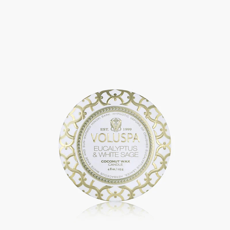 Voluspa candle tin with decorative pattern on a white background