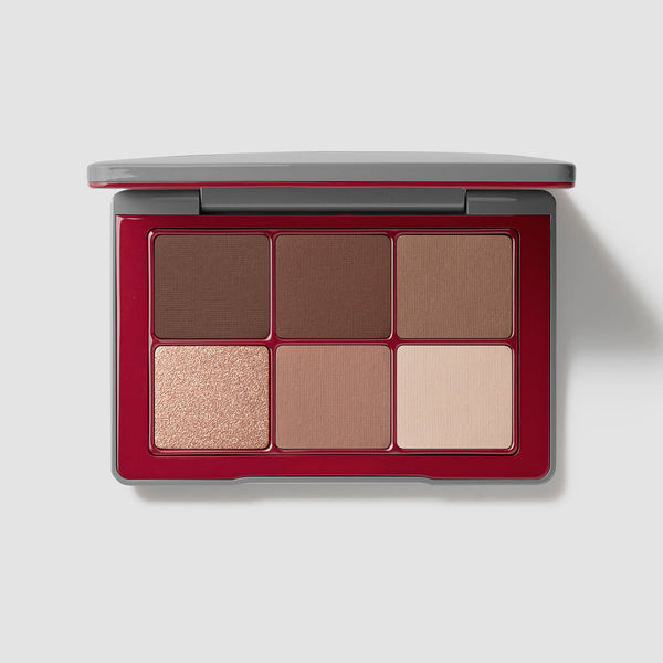 Westman Atelier The Eyeshadow Holiday Edit Toujours Fête palette in a burgundy compact with five matte neutrals and one champagne shimmer
