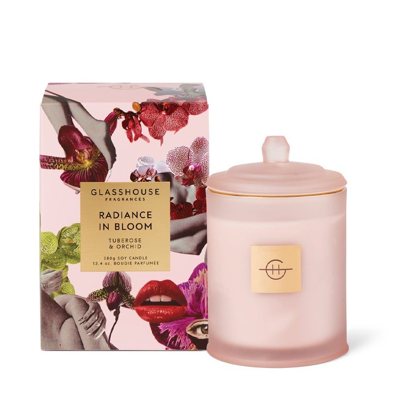 Glasshouse Fragrances candle and packaging with floral design on a white background