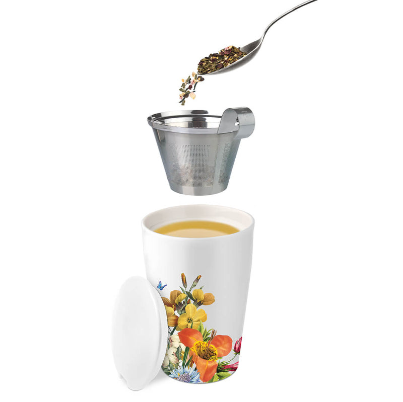 Jubilee Kati Steeping Cup, open with lid off, and tea being added from above to the infuser