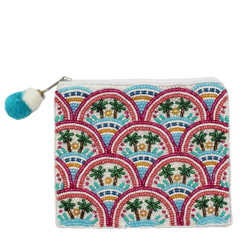 Colorful pouch with palm tree pattern and pom-pom tag on a white background