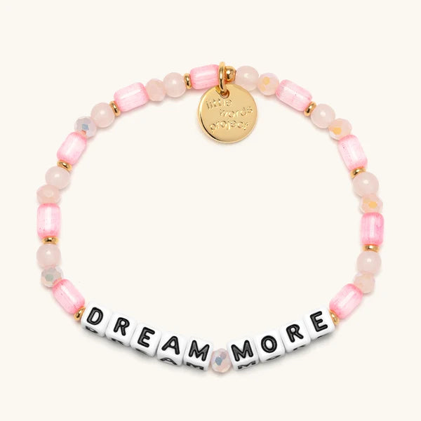 Dream More bracelet in pink beads with white letter beads, Dolly Parton's Imagination Library