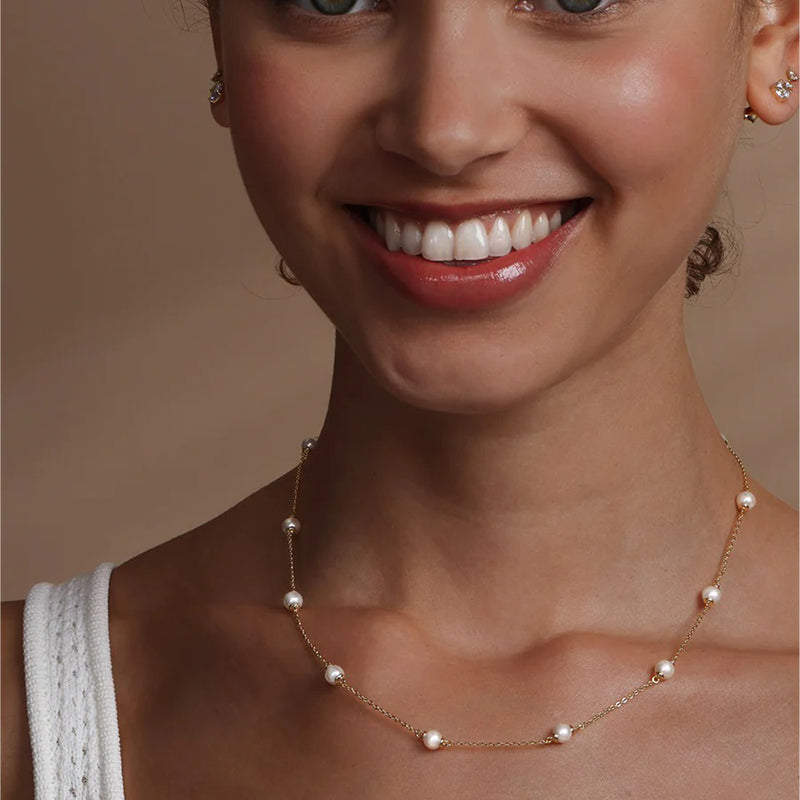 melinda-maria-perfect-pearl-infinity-necklace-gold-modeled