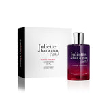 Juliette Has A Gun Purple Trouble Eau de Parfum 100 ml bottle beside its white and black box