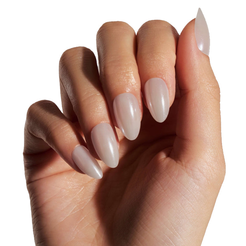 Hand with beige nail polish on a white background