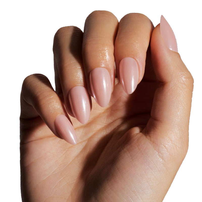 Close-up of a hand with pink nail polish on a white background