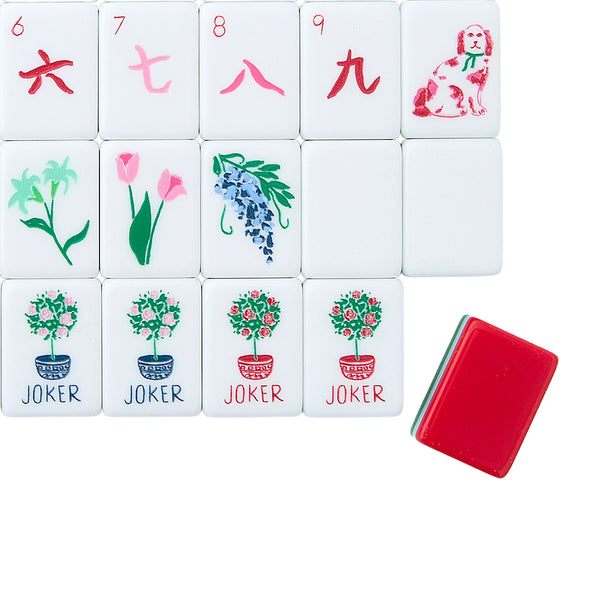 Set of tiles with floral and animal designs on a white background