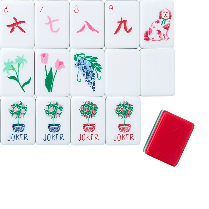 Set of tiles with floral and animal designs on a white background