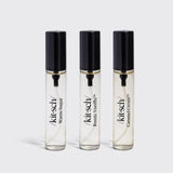 Three Kitsch hair perfume bottles: Warm Sugar, Rustic Vanilla, and Caramel Creamy on white background