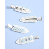 Pearl hair clips with bride and bestie text designs on light blue background