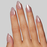 Mauve shimmer press-on nails with almond shape worn on hand against neutral background