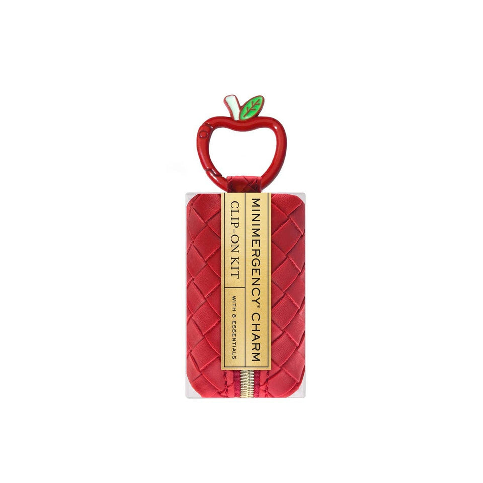 Red apple-shaped Pinch Provisions Minimergency Charm with quilted leather pouch and gold label