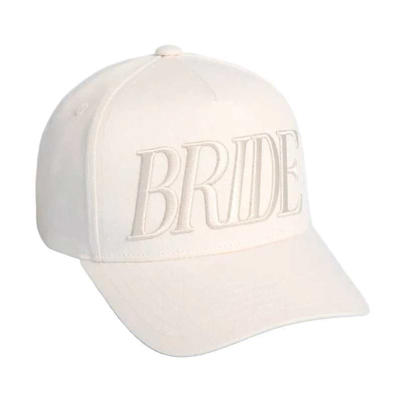 Cream white BRIDE trucker hat with embroidered lettering on light blue background