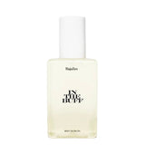 Baja Zen In The Buff Body Glow Oil in clear glass bottle with white cap on white background