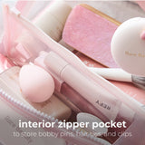 Ballet pink cosmetic bag with interior zipper pocket for bobby pins, hair ties, and clips