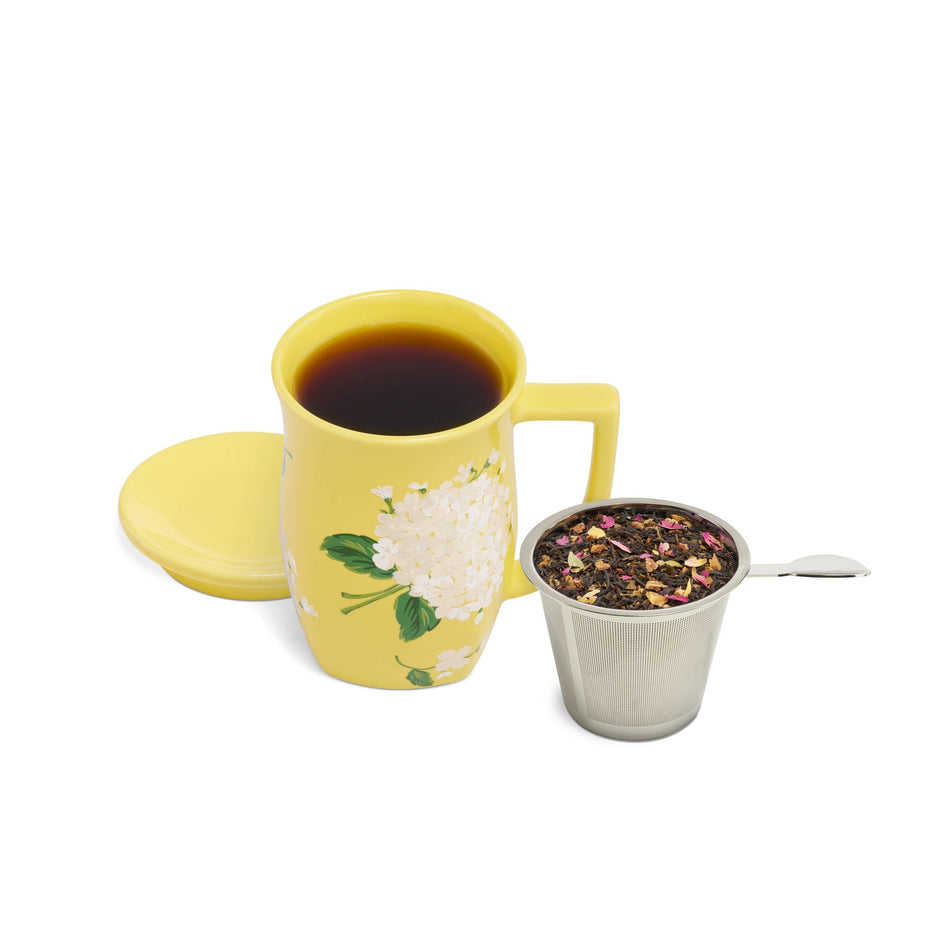 Tea Forte Hydrangea Fiore yellow steeping cup with infuser and lid on white background