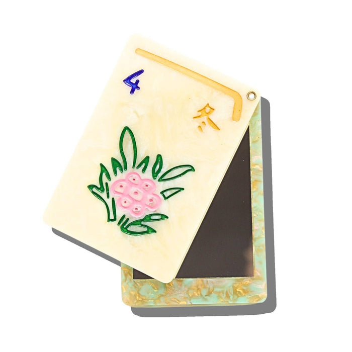 Hand-painted flower mahjong compact mirror with pink floral design and green leaves on cream background
