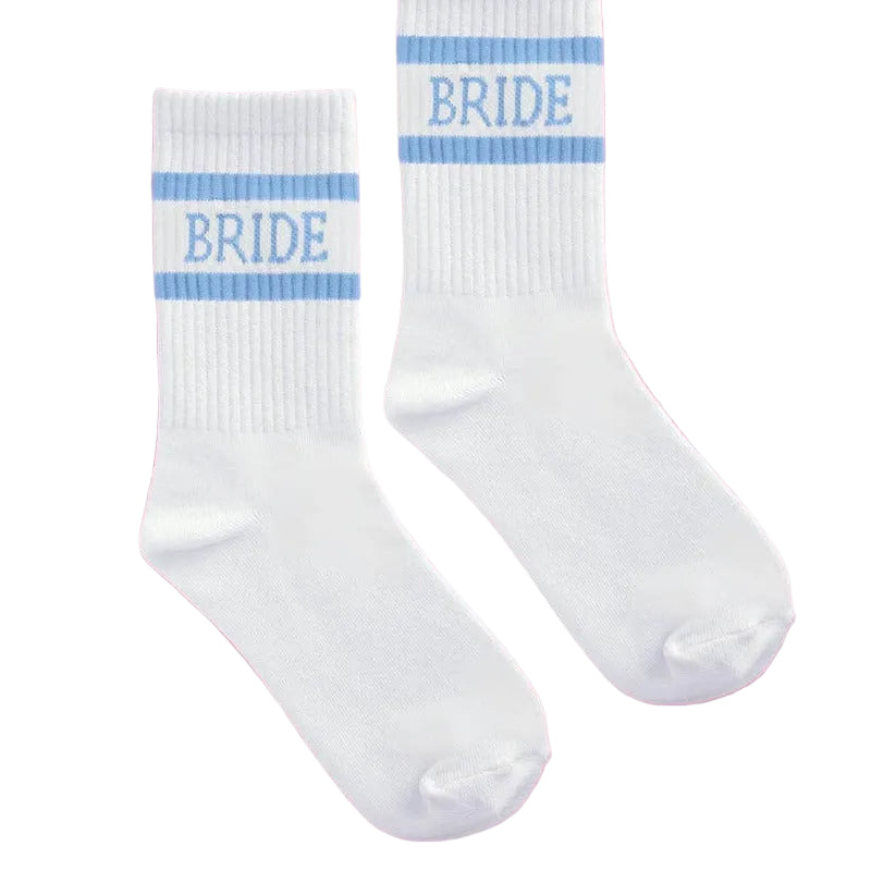 Blue and white bride socks with striped design on pink background