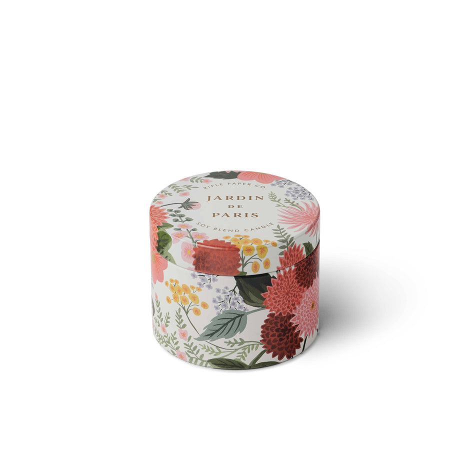 Floral-patterned cylindrical container with 'Jardin de Paris' text on a white background