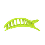Neon yellow TELETIES Large flat round hair claw clip with black rectangular vents on black background