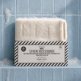 Spongellé Men's Extreme Back Scrubber with bergamot scent on blue tile background