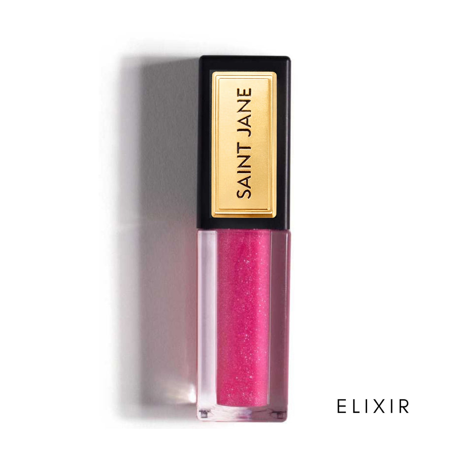 Saint Jane Lip Shine in Elixir - pink shimmer liquid lipstick with gold label and black cap