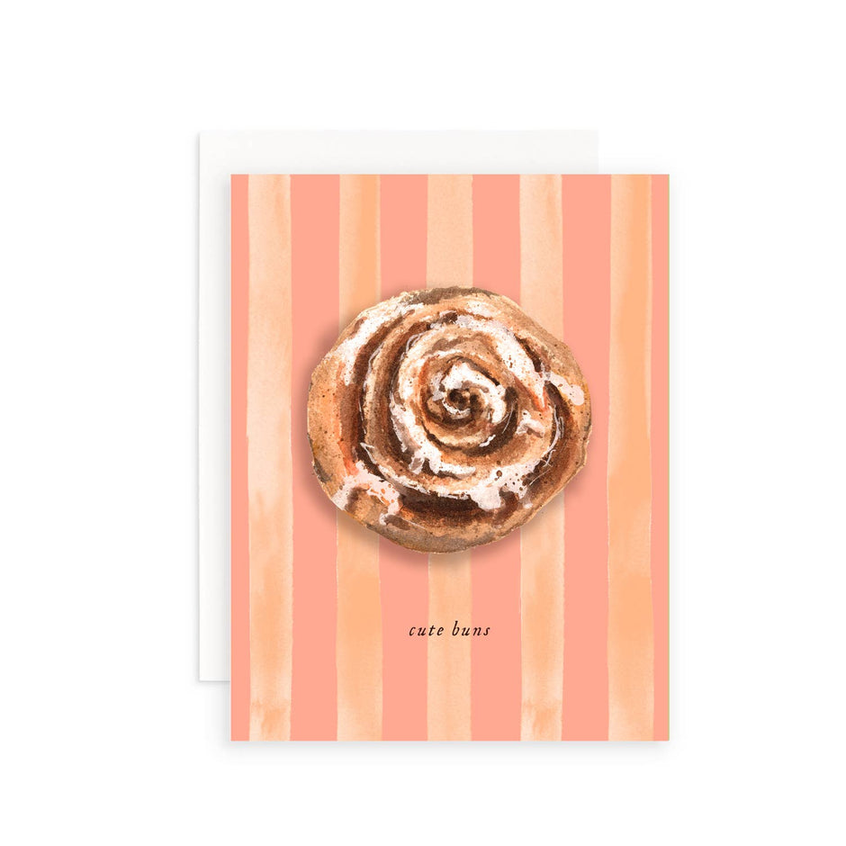 Cinnamon roll on a striped background with 'cute bun' text