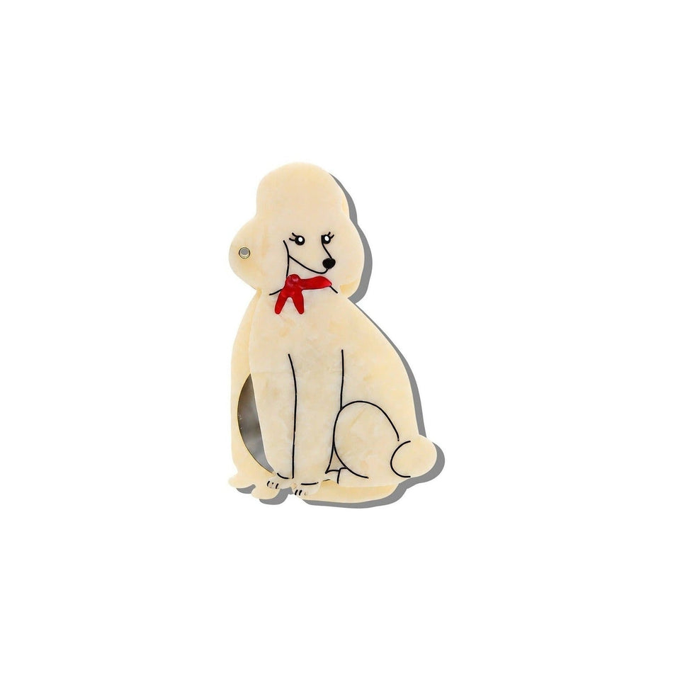 Cream-colored hand-painted poodle compact mirror with red bow on white background