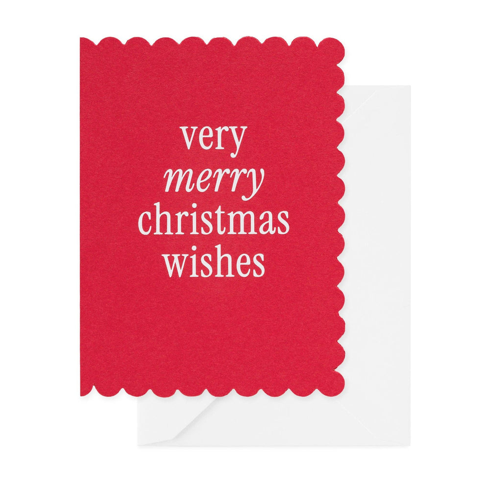 Red scalloped-edge Christmas card with white text reading 'very merry christmas wishes'