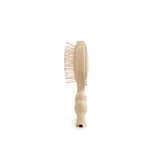 TELETIES Mini Detangler Brush for Medium Hair in Tan with dual-sided bristles on white background