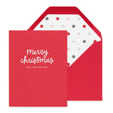 Red envelope with white polka dot lining and 'merry christmas' text greeting card