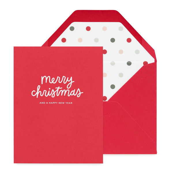 Red envelope with white polka dot lining and 'merry christmas' text greeting card