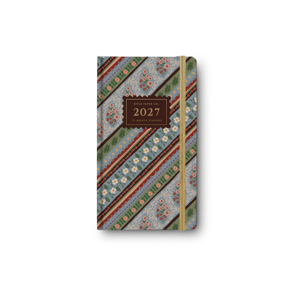 2027 planner with floral and striped design on a white background