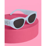 Blue bride sunglasses with dark lenses on pink background, bachelorette party accessory