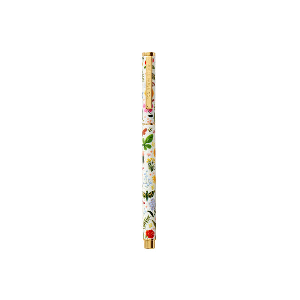 Rifle Paper Co. Curio Pen with floral design and gold accents on white background