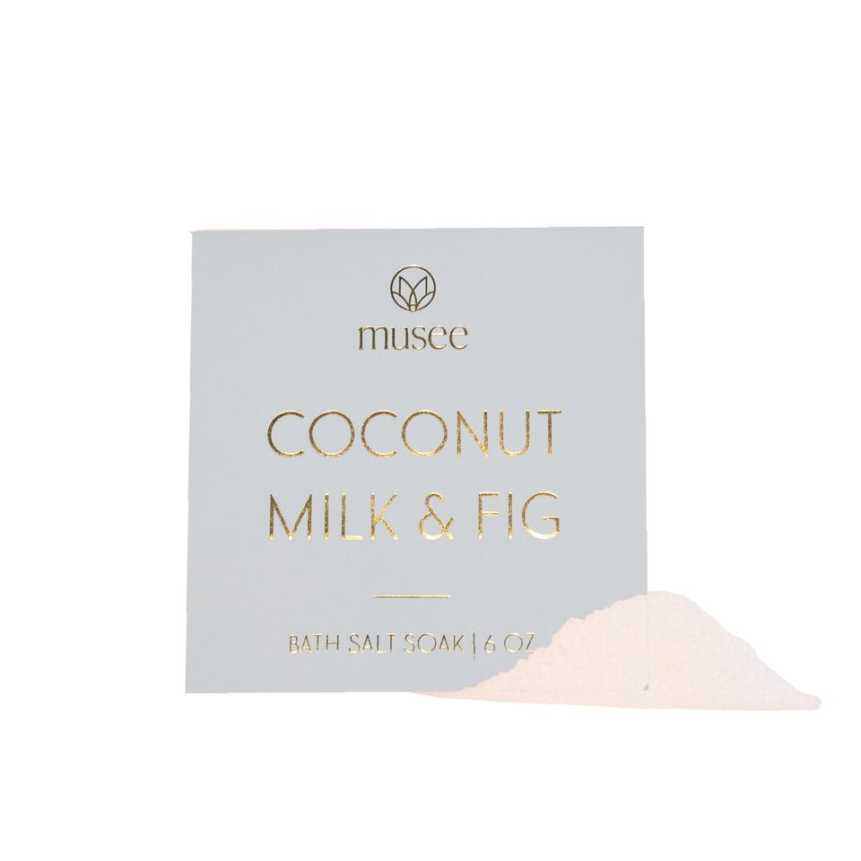 Musee Coconut Milk & Fig Bath Salt Soak 6oz with pale pink salt displayed