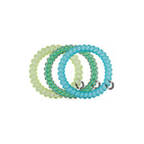 TELETIES Cabana Cutie small hair ties in yellow, turquoise, and patterned styles on black background